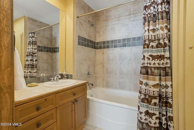 bathroom featuring vanity and shower / bath combo with shower curtain