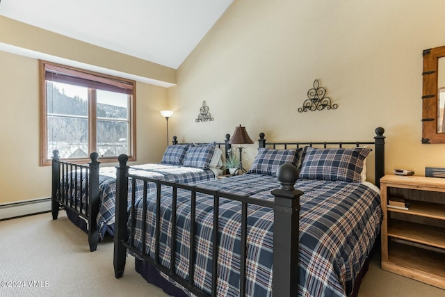 carpeted bedroom featuring vaulted ceiling and baseboard heating