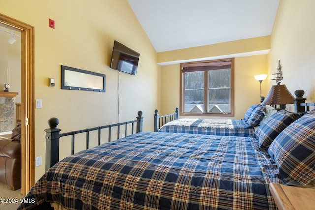 bedroom with vaulted ceiling