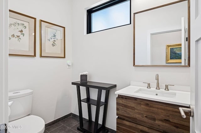 2296 E Haystacker Dr, Eagle, CO 81631 - bathroom with tile patterned flooring, toilet, vanity, and baseboards