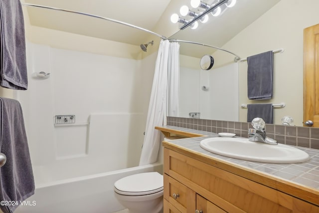 bathroom with shower / bathtub combination with curtain, vanity, toilet, and decorative backsplash