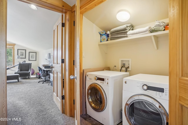 laundry room with laundry area, dark carpet, and washer and dryer