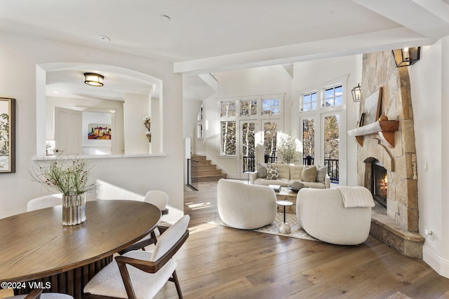 living room with hardwood / wood-style flooring and a fireplace