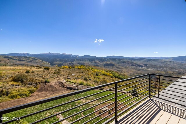 balcony featuring a mountain view