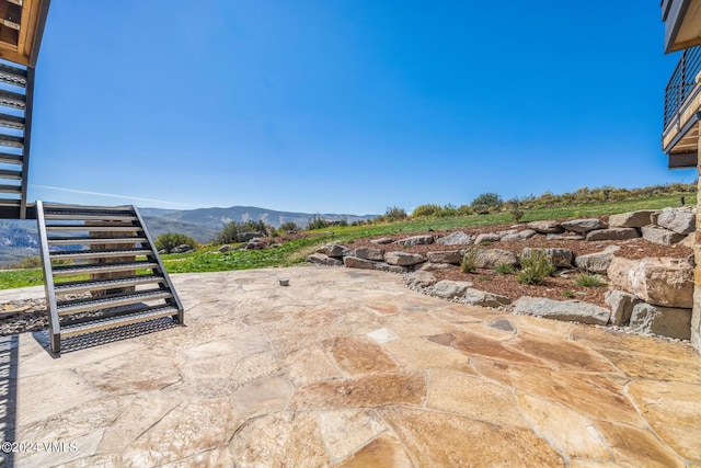 view of patio featuring a mountain view