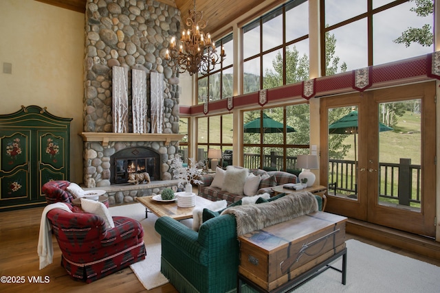 32 Greystone Ct, Beaver Creek, CO 81620 - living area with wood finished floors, a chandelier, french doors, high vaulted ceiling, and wood ceiling