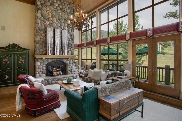 32 Greystone Ct, Beaver Creek, CO 81620 - living area with wood finished floors, a chandelier, french doors, high vaulted ceiling, and wood ceiling