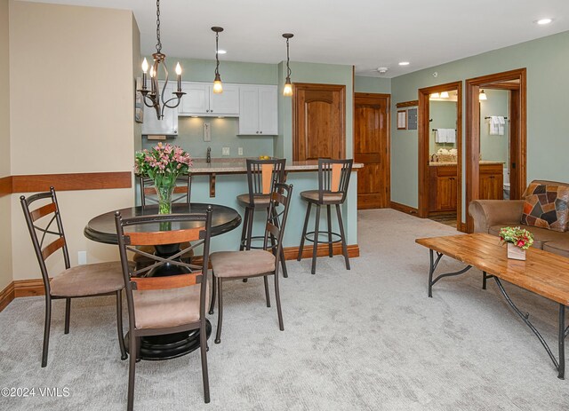 view of carpeted dining space