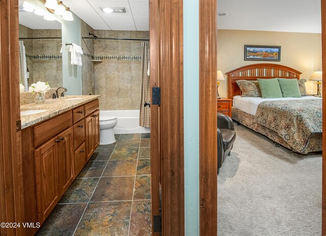 full bathroom featuring vanity, toilet, and shower / bath combo