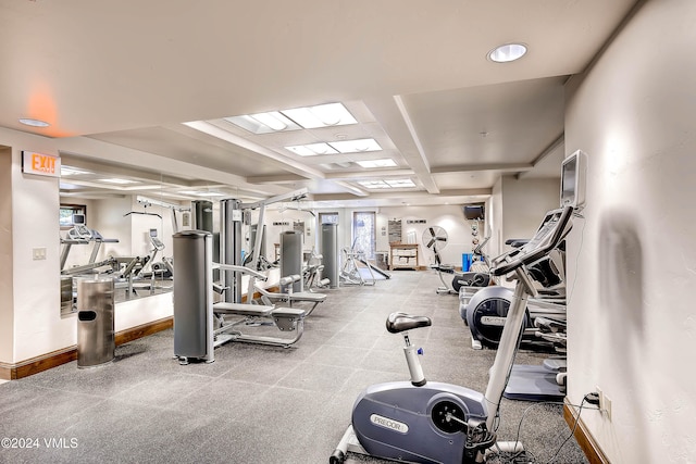 gym with coffered ceiling