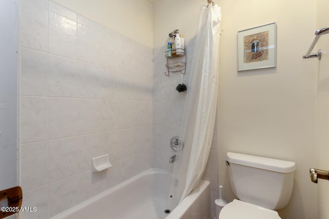 full bathroom featuring toilet and shower / tub combo