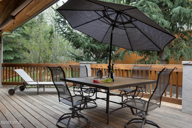 deck featuring outdoor dining space