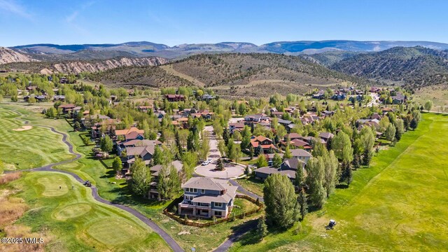 207 Aidan Rd, Eagle, CO 81631 - aerial perspective of suburban area with a mountain backdrop and a golf club