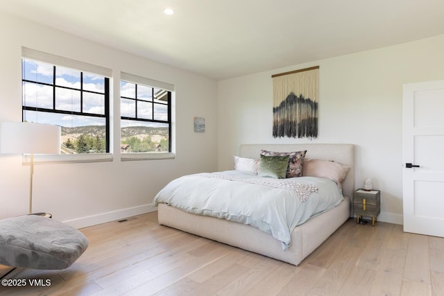 207 Aidan Rd, Eagle, CO 81631 - bedroom featuring baseboards, light wood-type flooring, and recessed lighting