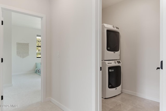 207 Aidan Rd, Eagle, CO 81631 - washroom with stacked washer / dryer and baseboards
