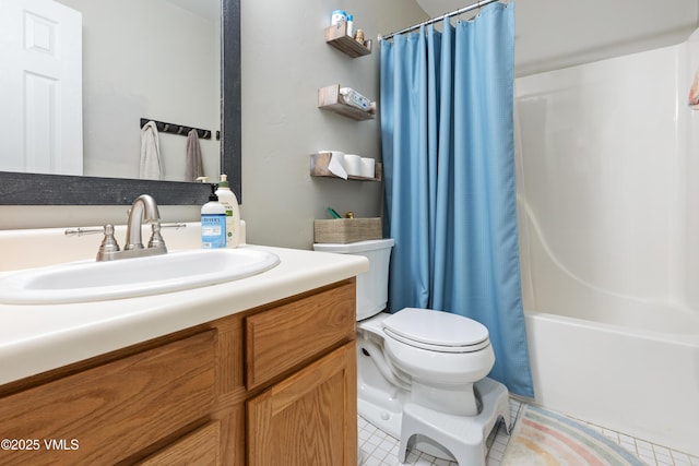 full bath with toilet, vanity, tile patterned flooring, and shower / tub combo