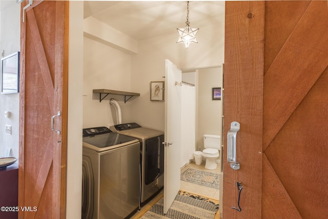 705 Nogal Rd Unit C9, Eagle, CO 81631 - laundry area featuring independent washer and dryer and tile patterned floors