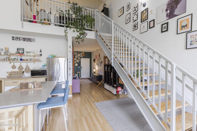 705 Nogal Rd Unit C9, Eagle, CO 81631 - stairway with wood finished floors and a high ceiling