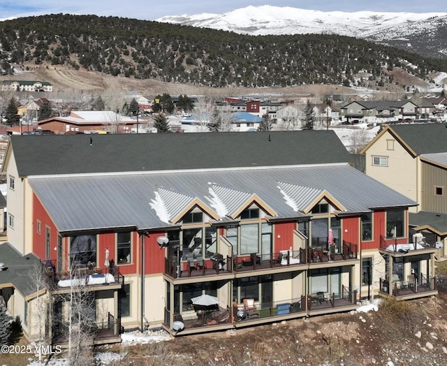 705 Nogal Rd Unit C9, Eagle, CO 81631 - snowy aerial view featuring a mountain view and a residential view