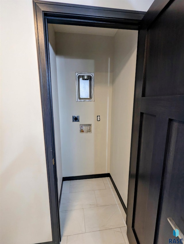 hallway featuring light tile flooring