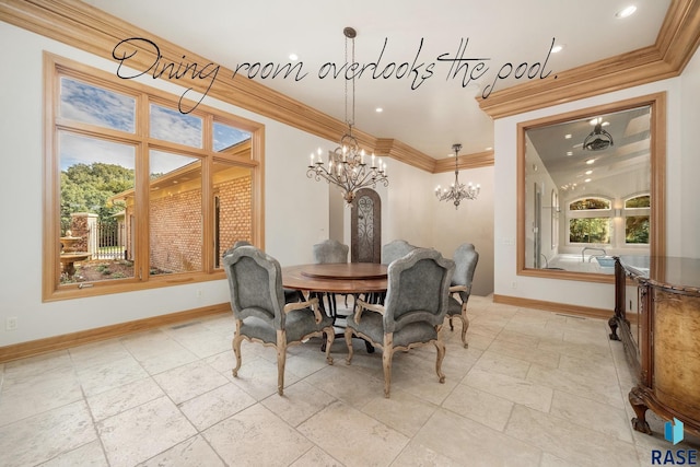 dining room featuring a healthy amount of sunlight, crown molding, and a chandelier