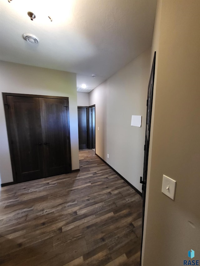 5304 S Bahnson Ave, Sioux Falls, SD 57108 - hall featuring dark wood-type flooring and baseboards