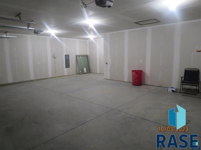5304 S Bahnson Ave, Sioux Falls, SD 57108 - garage with electric panel and a garage door opener