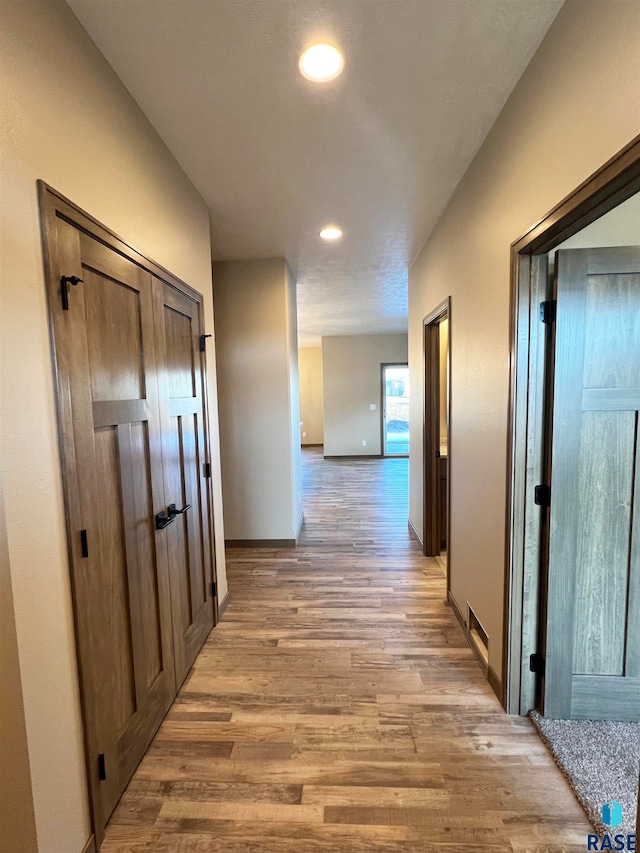 hall featuring light hardwood / wood-style floors