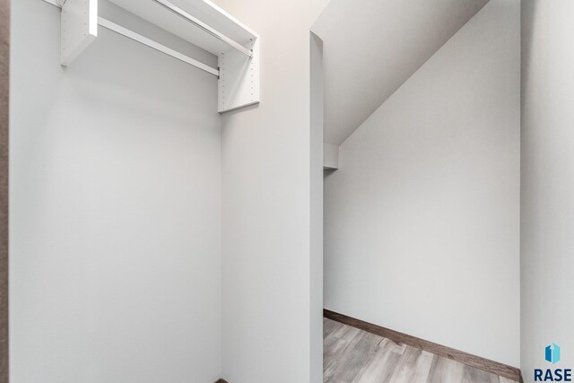 117 N Summit Ave, Tea, SD 57064 - walk in closet with light hardwood / wood-style flooring