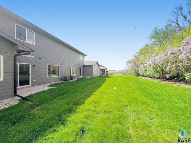 117 N Summit Ave, Tea, SD 57064 - view of yard featuring cooling unit and a patio area