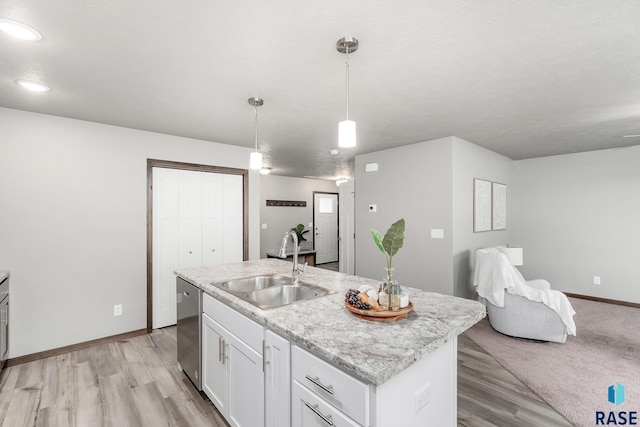 117 N Summit Ave, Tea, SD 57064 - kitchen featuring pendant lighting, sink, white cabinetry, a center island with sink, and stainless steel dishwasher