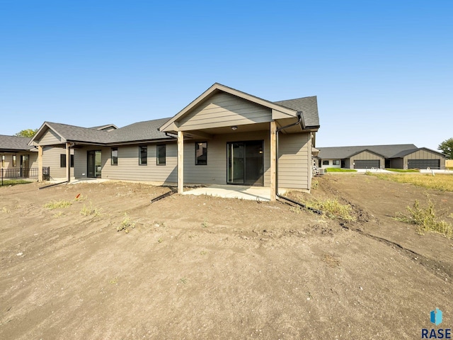 rear view of house featuring a patio area