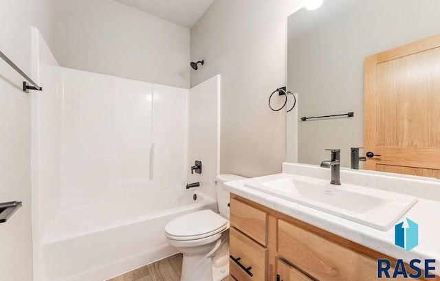1437 N Mae Pl, Tea, SD 57064 - full bathroom featuring hardwood / wood-style flooring, shower / washtub combination, toilet, and vanity