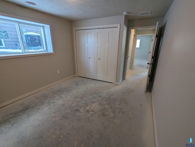 unfurnished bedroom featuring a closet