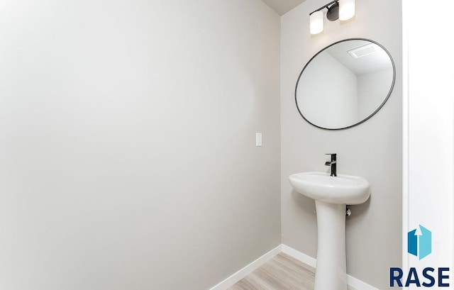 bathroom featuring hardwood / wood-style floors