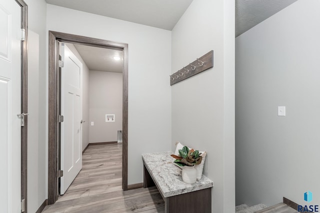 hall featuring light hardwood / wood-style floors