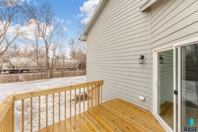 view of snow covered deck