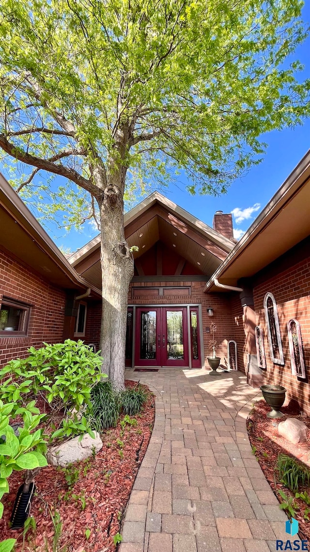 property entrance featuring french doors