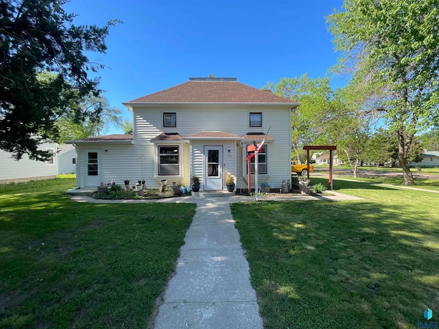 view of front of property with a front lawn