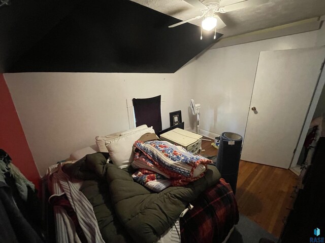 bedroom featuring ceiling fan and hardwood / wood-style flooring