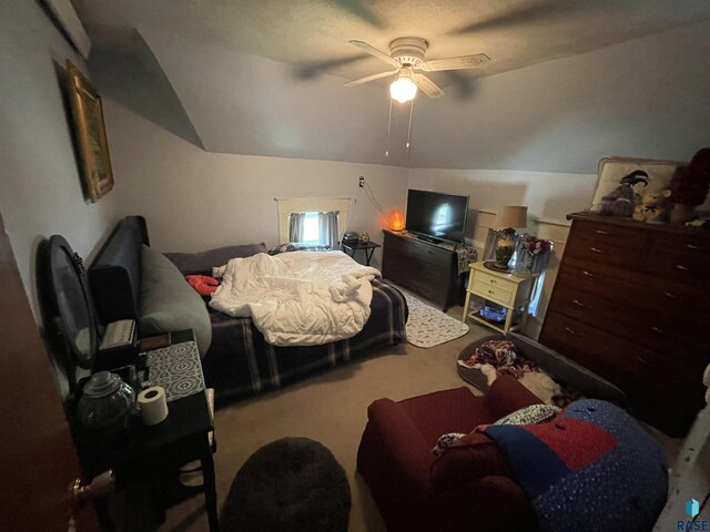 carpeted bedroom featuring ceiling fan and lofted ceiling