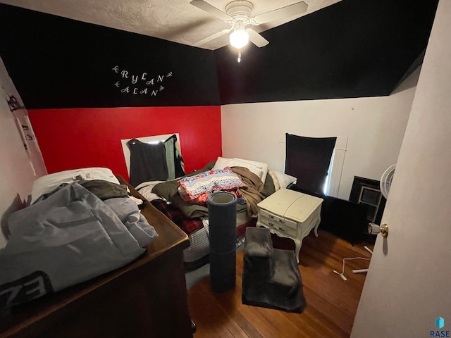 bedroom featuring ceiling fan and wood-type flooring