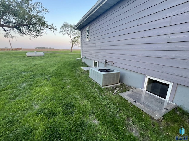 view of yard with central AC