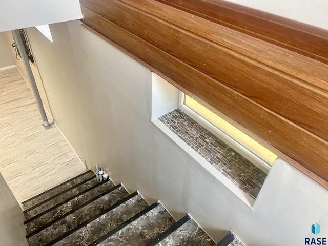 stairway with wood-type flooring