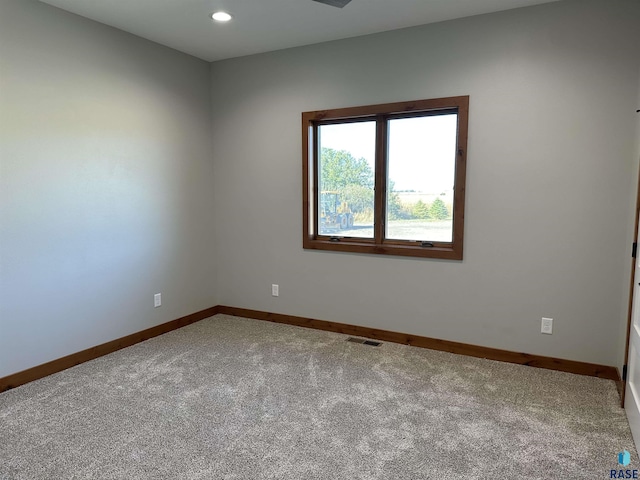 view of carpeted spare room