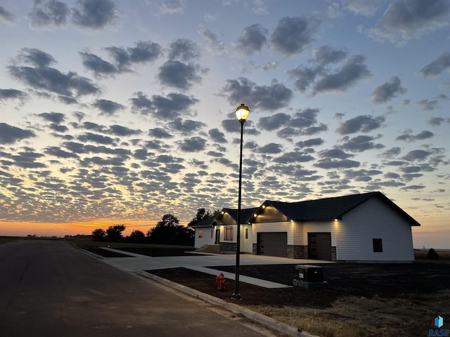 view of outdoor building at dusk