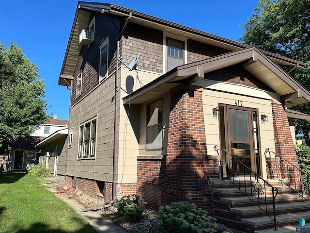 view of front of home with a front lawn