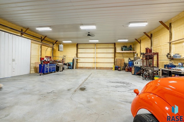 garage with a workshop area