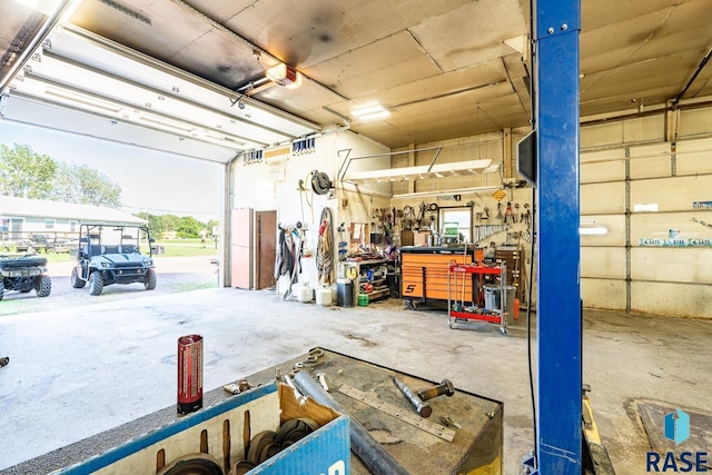 garage featuring a workshop area