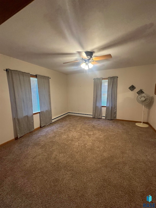 unfurnished room featuring ceiling fan and carpet floors